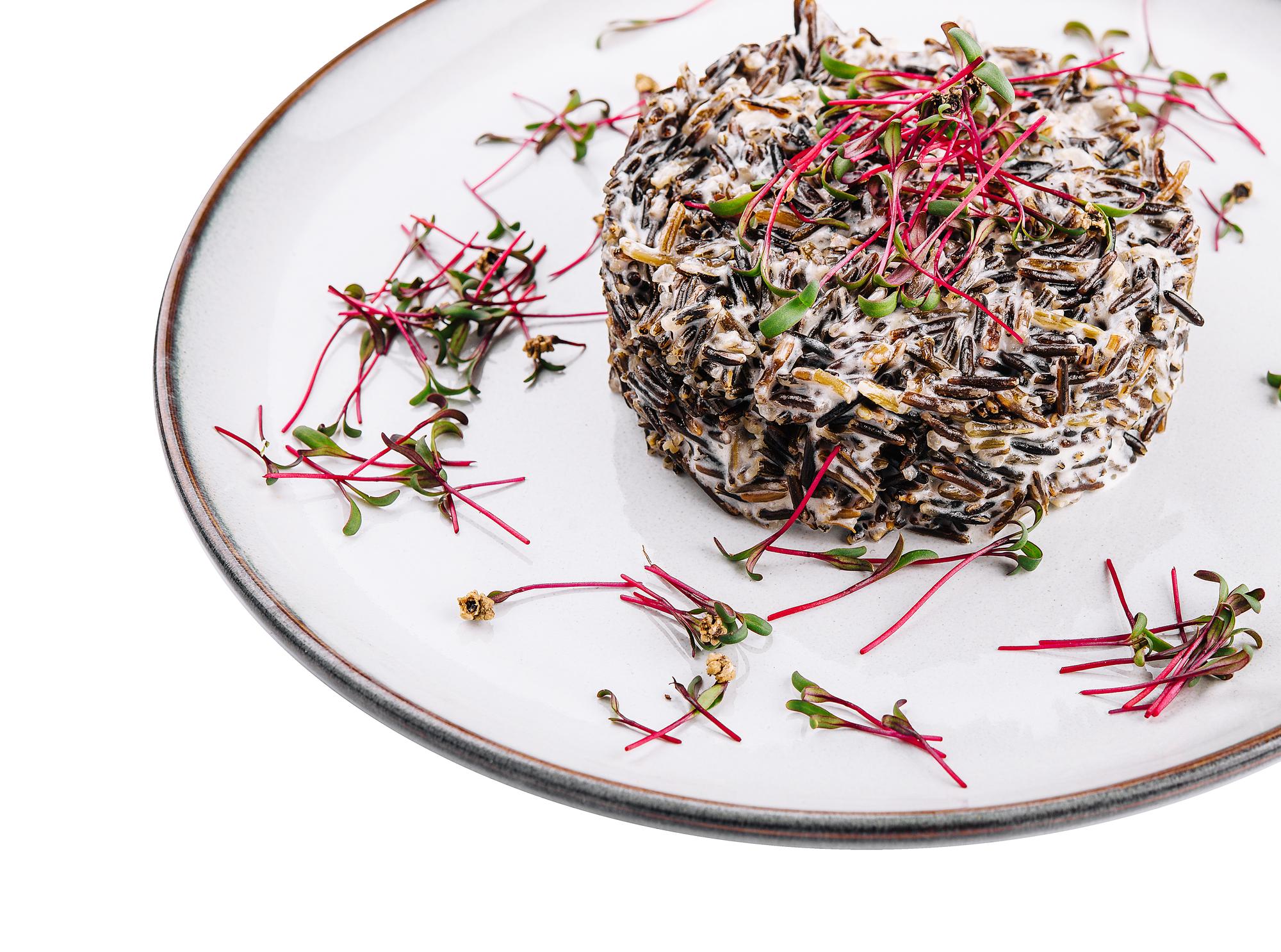 Close-up of plated starter with microgreens
